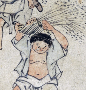 A man who seems tired of work, in "Rice threshing" (detail) from Kim Hongdo, album of genre paintings, 18th century, Joseon Dynasty, 39.7 × 26.7 cm, Treasure 527 (National Museum of Korea)