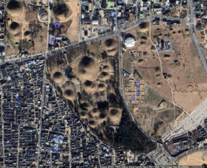 View of the wooden-chamber tombs with stone mounds of Gyeongju. This burial ground has great significance in the history of Korean archaeology, as the site of the first excavation ever conducted by Korean archaeologists, in 1946 (underlying map © Google)