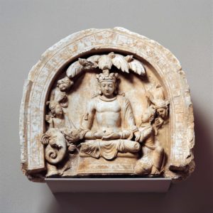 Niche with the Seated Bodhisattva Shakyamuni Flanked by Devotees and an Elephant, c. 4th–5th century, stucco, Afghanistan (Hadda), 42 x 46.4 cm (The Metropolitan Museum of Art)