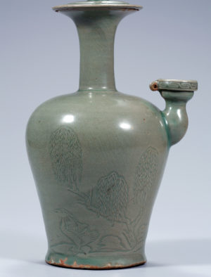 Kundika bottles were produced not only in metal, but also as ceramics. This celadon kundika bottle with a waterside landscape design is designated as Treasure 344. Celadon Kundika with Reeds and Wild Geese in Relief, 12th century Goryeo, celadon, from the Gaeseong area, H. 34.2cm, (bottom) D. 9.3cm, Terasure 344 (National Museum of Korea)