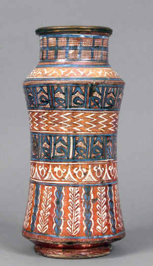 Pharmacy jar, c. 1400–50, tin-glazed earthenware, probably made in Manises, Valencia, Spain, 33.2 x diam. 15.6 cm (The Metropolitan Museum of Art)