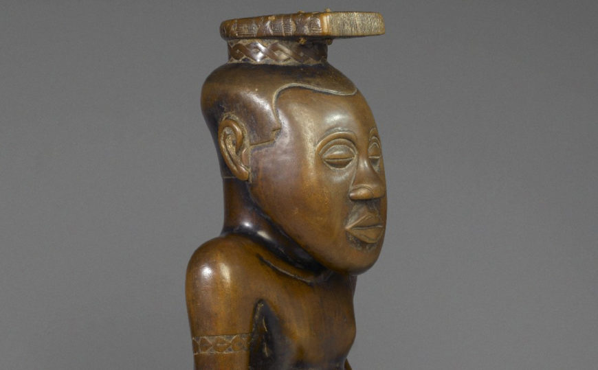 Detail, Ndop Portrait of King Mishé miShyááng máMbúl, c. 1760–80, wood and camwood powder, 19-1/2 x 7-5/8 x 8-5/8 inches (Brooklyn Museum)