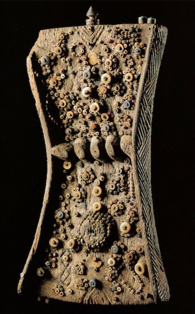 Lukasa (memory board), Mbudye Society, Luba peoples (Democratic Republic of the Congo), c. 19th–20th century, wood, beads, and metal (private collection)