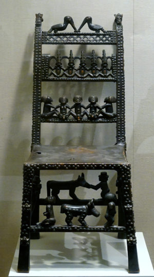 Chair: Rungs with Figurative Scenes (Ngundja), Chokwe peoples, 19th–20th century, wood, brass tacks, and leather, 99.1 x 43.2 x 61.6 cm, Angola (The Metropolitan Museum of Art; photo: Steven Zucker, CC BY-NC-SA 2.0)