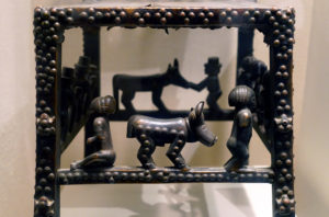 Detail, Chair: Rungs with Figurative Scenes (Ngundja), Chokwe peoples, 19th–20th century, wood, brass tacks, and leather, 99.1 x 43.2 x 61.6 cm, Angola (The Metropolitan Museum of Art; photo: Steven Zucker, CC BY-NC-SA 2.0)