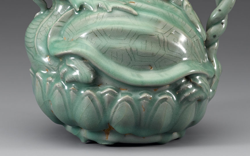 Detail of hexagonal turtle-shell motif with “王” character (“king”) and lotus pedestal. Celadon turtle-shaped ewer, 12th century (Goryeo), 17.3 x 20.2 cm, National Treasure 96 (National Museum of Korea)