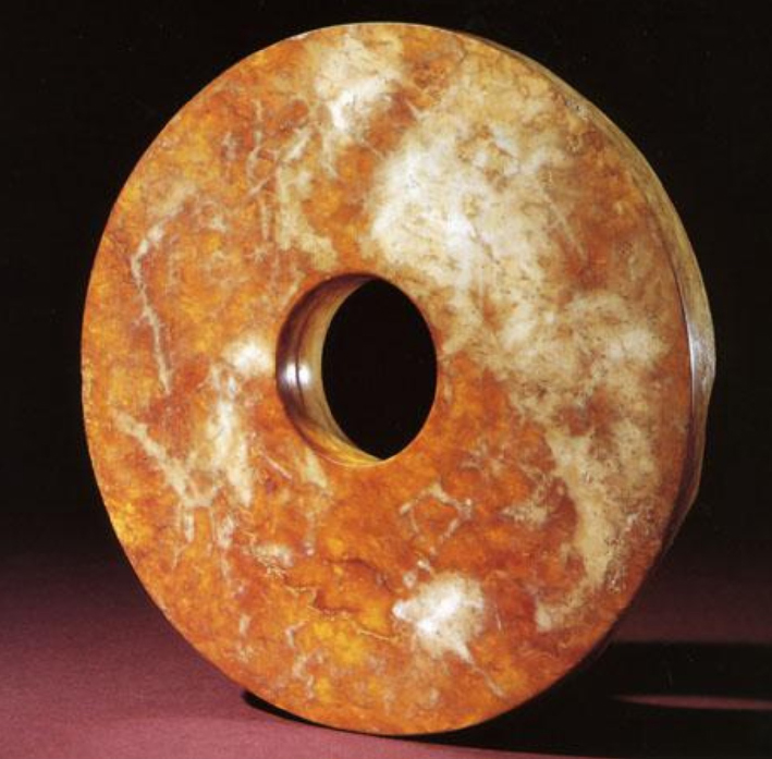 Jade disc, or bi, Liangzhu culture, 3300BC–2200B.C.E., 18 cm in diameter © Private Collection, © Trustees of the British Museum