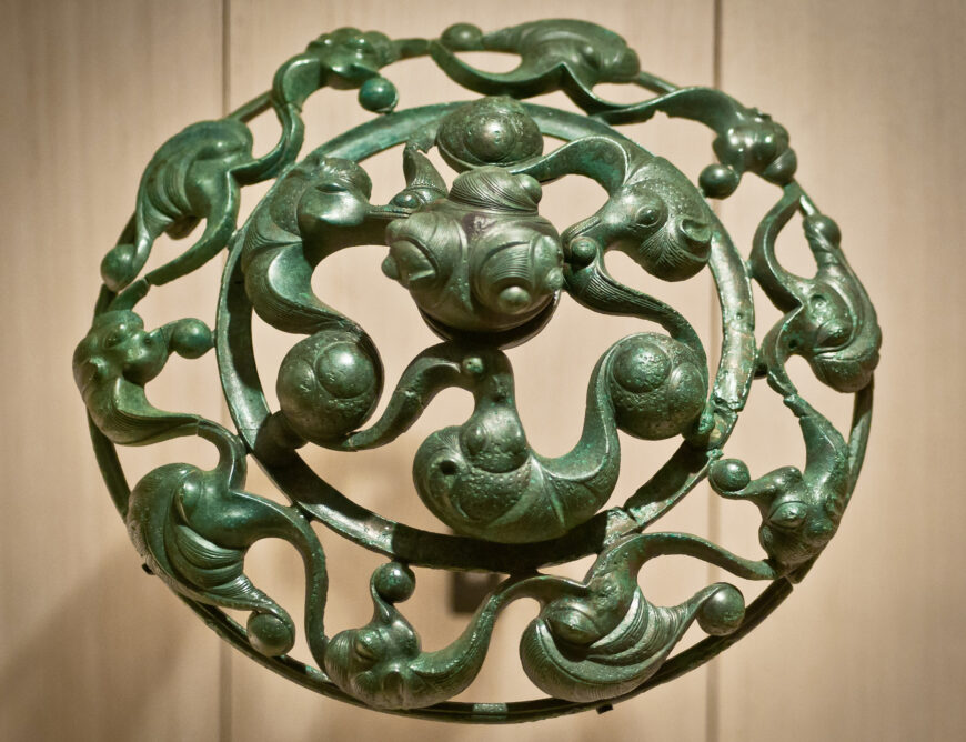 Celtic patterned disk, 2nd century B.C.E., bronze, 20 cm diameter, excavated from a tomb at Roissy in 1999 (Musée d’Archéologie Nationale, Saint-Germain-en-Laye, photo: BastienM, CC BY-SA 3.0)