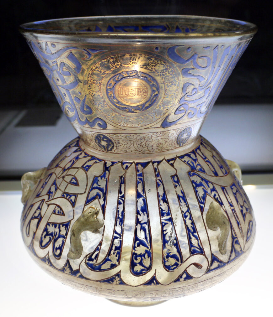 Light shining through blazon, glass lamp for mosque of sultan Hassan, Egypt, 1354–61, enameled and gilt glass, 35 cm high (Calouste Gulbenkian Museum; photo: Sailko, CC BY 3.0)