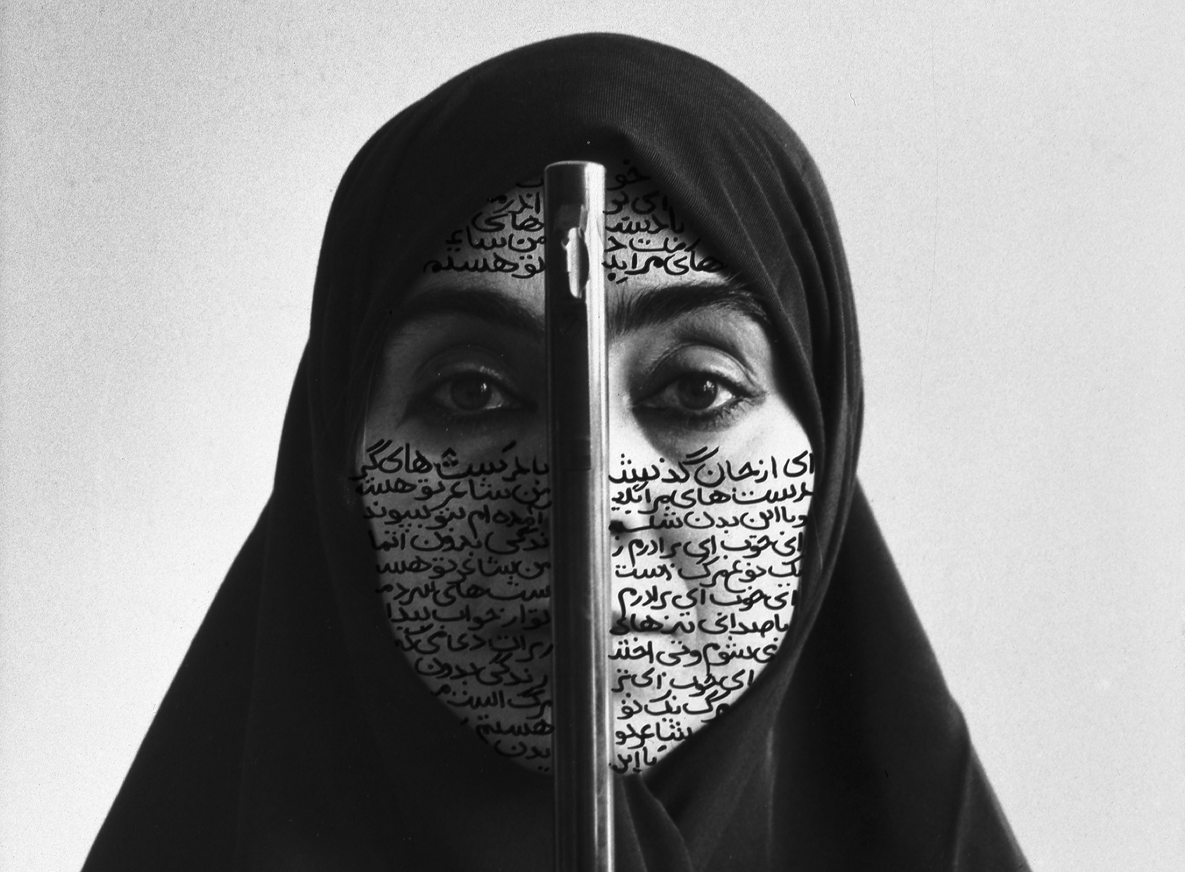 Calligraphy (detail), Shirin Neshat, Rebellious Silence, Women of Allah series, 1994, ink and black and white print on RC paper (courtesy Barbara Gladstone Gallery, New York and Brussels) © Shirin Neshat