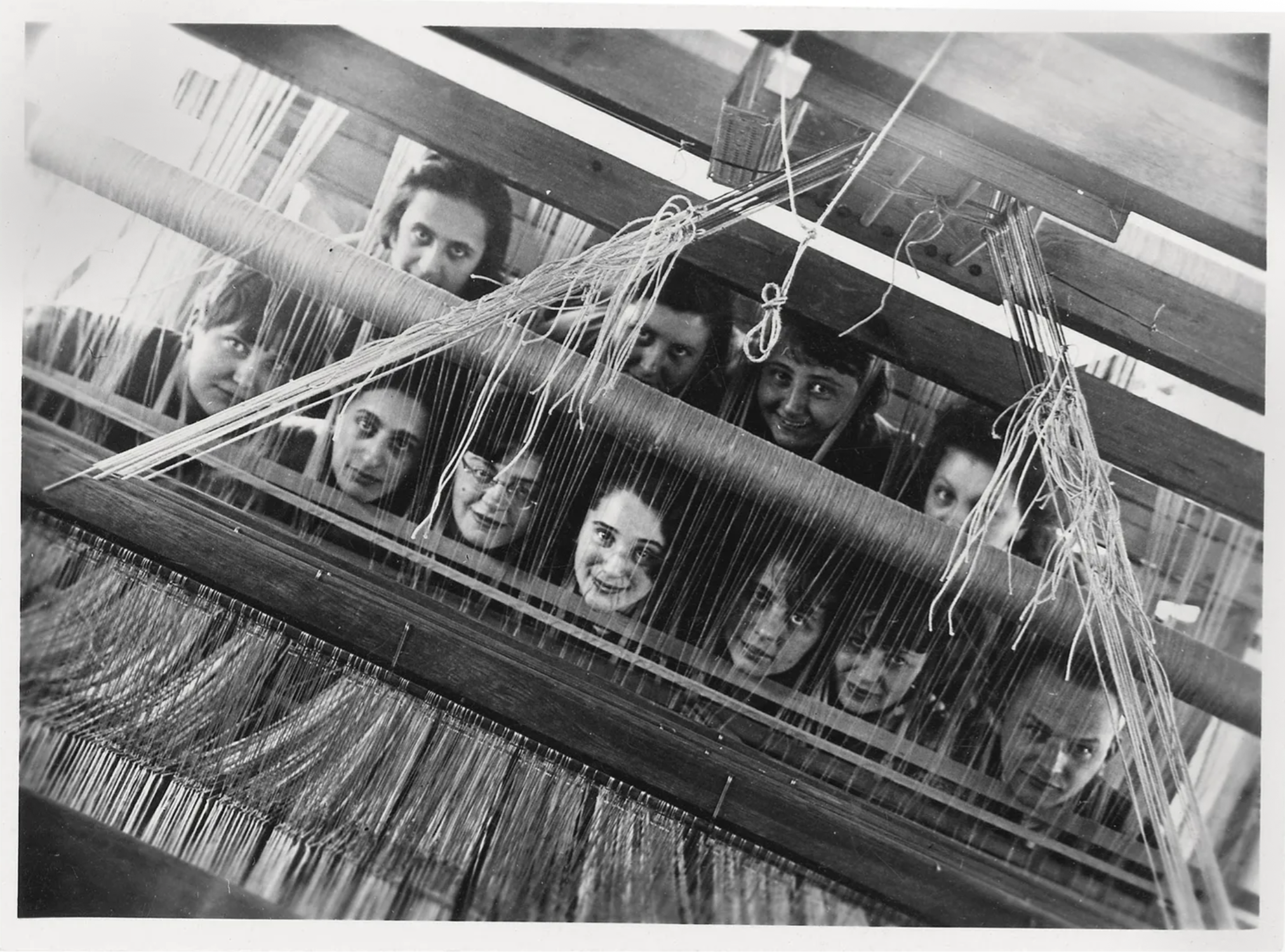 Weaving students at the Bauhaus, 1928, Anni Albers poses in the bottom row, second from left (Bauhaus Archive, Berlin)