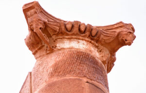 Elephant-headed capital, limestone, Petra. Found in the triple colonnades of the Lower Temenos (sacred district). The decoration from top to bottom consists of a plain band, egg and dart motif, and the cornice with a plain band with tripartite molding in a double wave. The corner decoration is an elephant head with fan-shaped ears.… Beneath the heads is an acanthus leaf extending downwards…. On the sides and resting on the elephant’s forehead is an incurving scroll with floral motifs (from the label "Elephant-headed Capitals" in the Archaeological Museum, Petra) (photo: Guillaume Baviere, CC BY 2.0)