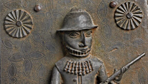 Artist Unidentified, Relief plaque (Portuguese soldier, detail), c. 16th–17th century, copper alloy, from Benin City, Edo Kingdom, Nigeria, 47 x 31 x 9 cm (© Trustees of the British Museum)