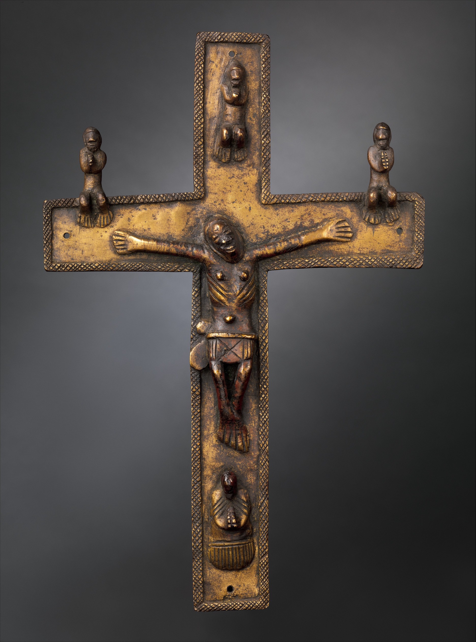 Crucifix, 16th–17th century (Kong Peoples, Democratic Republic of the Congo; Angola; Republic of the Congo), solid cast brass, 27.3 cm high (The Metropolitan Museum of Art, New York)