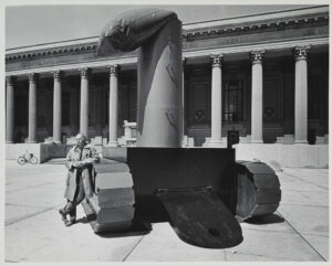 Claes Oldenburg standing next to Lipstick (Ascending) on Caterpillar Tracks in the Beinecke Plaza at Yale University. Claes Oldenburg, Lipstick (Ascending) on Caterpillar Tracks, 1969 (Getty Research Institute, Los Angeles; photo: Harry Shunk and Janos Kender) © Estate of Harry Shunk