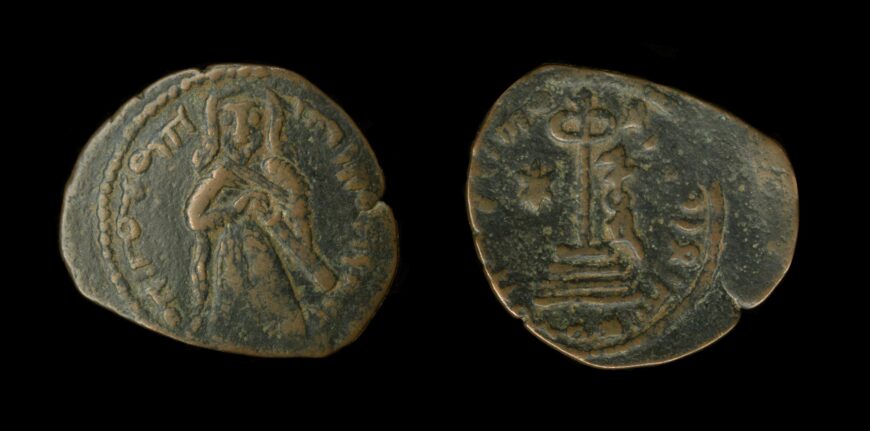Alloy Coin, Standing caliph type, pre-697 C.E. (reign of ‘Abd al-Malik), minted in Homs, Syria (© The Trustees of the British Museum, London)