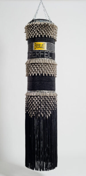 Jeffrey Gibson, I'm Not Perfect, 2014, found canvas punching bag, repurposed wool army blanket, glass beads, tin jingles, nylon fringe, artificial sinew, acrylic paint, 191.8 x 40.6 x 40.6 cm (photo: Marc Straus Gallery) © Jeffrey Gibson Studio