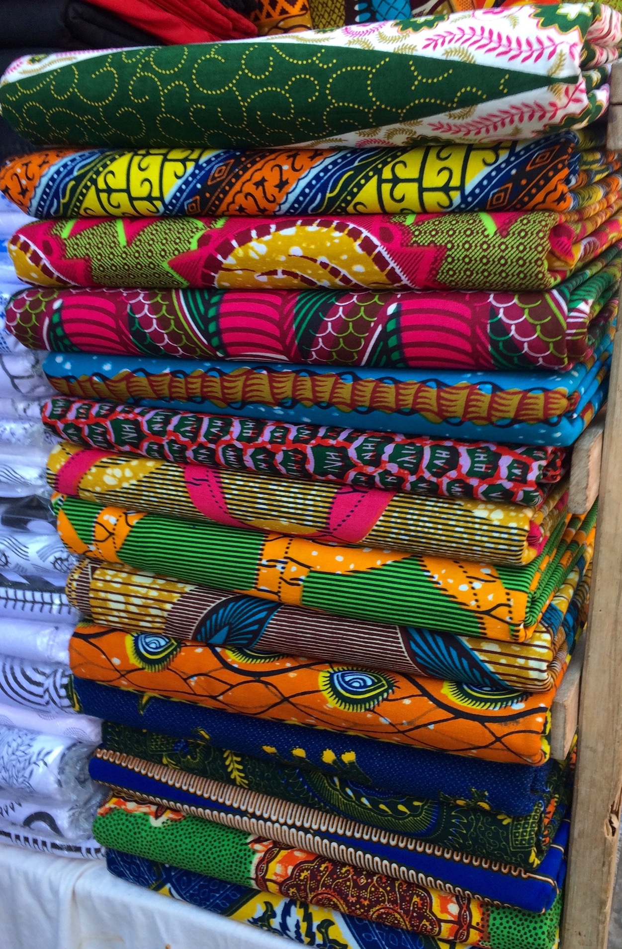 Wax print fabrics in a West African shop (photo: Rachel Strohm, CC BY-ND 2.0)
