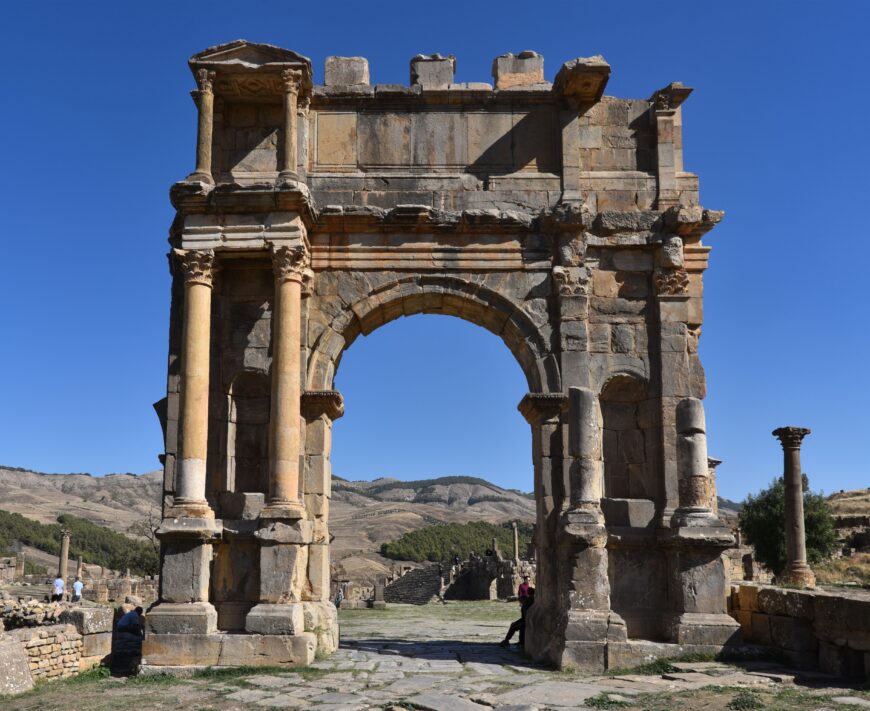 Arch dedicated by the colony of Cuicul to Caracalla, Julia Domna, and the deceased Septimius Severus, Djémila, Algeria, 216 C.E. (photo: Carole Raddato, CC BY-SA 2.0). Reconstructed in 1922, during the French occupation
