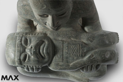 Smaller figure (detail), Señor de Las Limas, c. 1200–400 B.C.E. (Olmec, Las Limas, Jesús Carranza, Veracruz), serpentine and pyrite, 23 x 43.5 x 55 cm (Museo de Antropología de Xalapa)