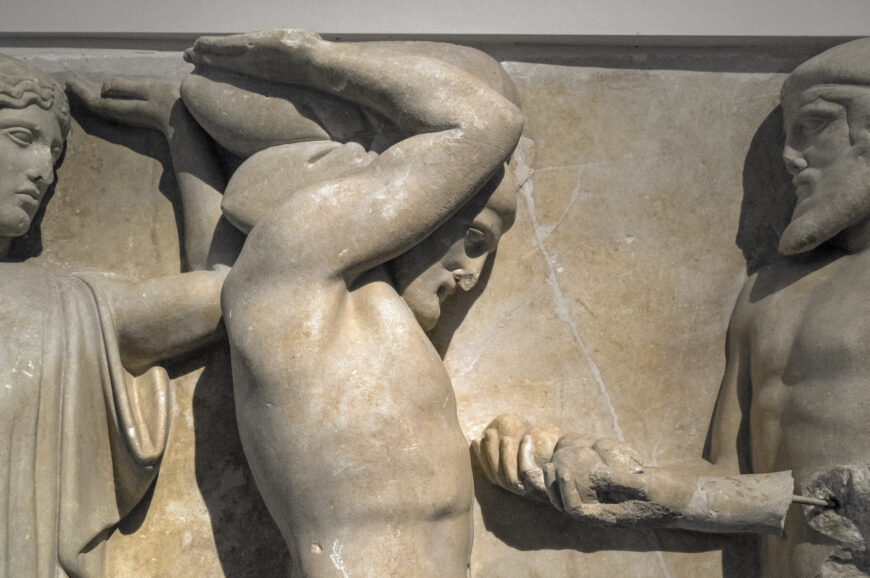 Athena, Herakles and Atlas (detail), east metope 4 from the Temple of Zeus at Olympia, 470–457 B.C.E., marble (Archaeological Museum of Olympia; photo: Egisto Sani, CC BY-NC-SA 2.0)
