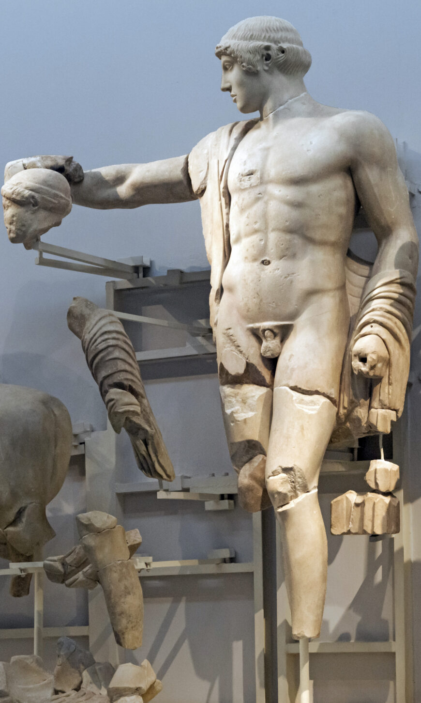 Apollo (detail), west pediment of the Temple of Zeus at Olympia, 470–457 B.C.E., marble, 3.3 m high (Archaeological Museum of Olympia; photo: Egisto Sani, CC-BY-NC 2.0)