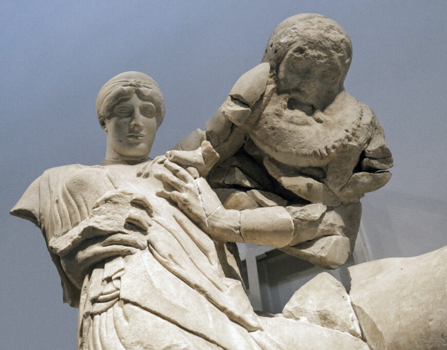 Lapith woman and a centaur (detail), west pediment of the Temple of Zeus at Olympia, 470–457 B.C.E., marble. The drill holes in the centaur’s head would once have held metal attachments, perhaps for locks of hair (Archaeological Museum of Olympia; photo: Egisto Sani, CC-BY-NC-SA 2.0)