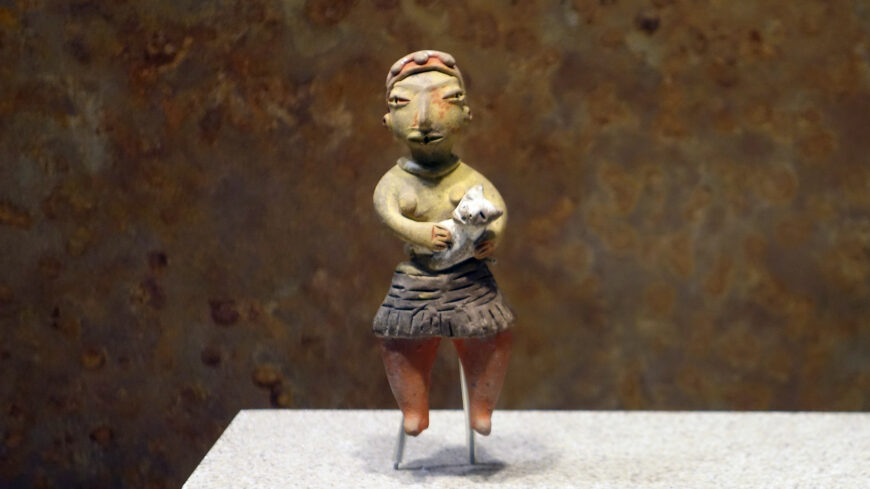 Tlatilco figurine of a woman with a dog, c. 1200–600 B.C.E. (Tlatilco), ceramic (National Museum of Anthropology, Mexico City; photo: Steven Zucker, CC BY-NC-SA 2.0)