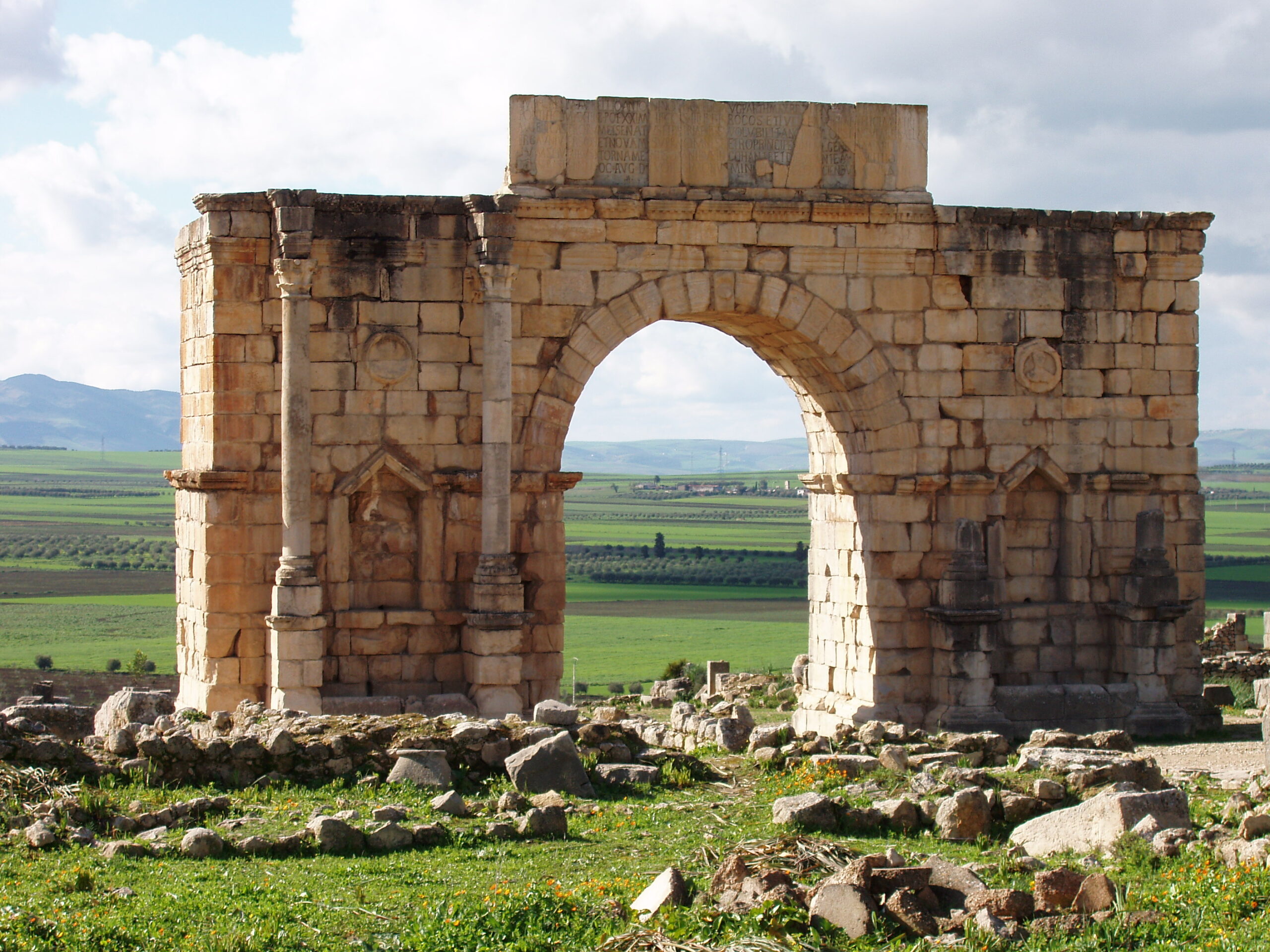 View of the arch monument dedicated to emperor Caracalla and his mother Julia Domna in 217 C.E. at Volubilis, Morocco. Volubilis was listed as a UNESCO World Heritage site in 1997 (photo: damian entwistle, CC BY-NC 2.0)