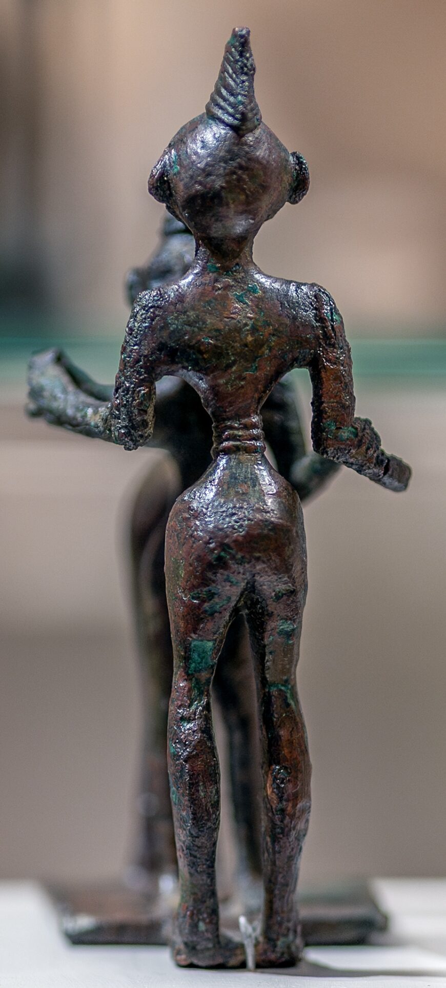 Back of man (detail), Man and centaur, c. 750 B.C.E., bronze, 11.10 cm high (The Metropolitan Museum of Art, New York; photo: Steven Zucker, CC BY-NC-SA 2.0)