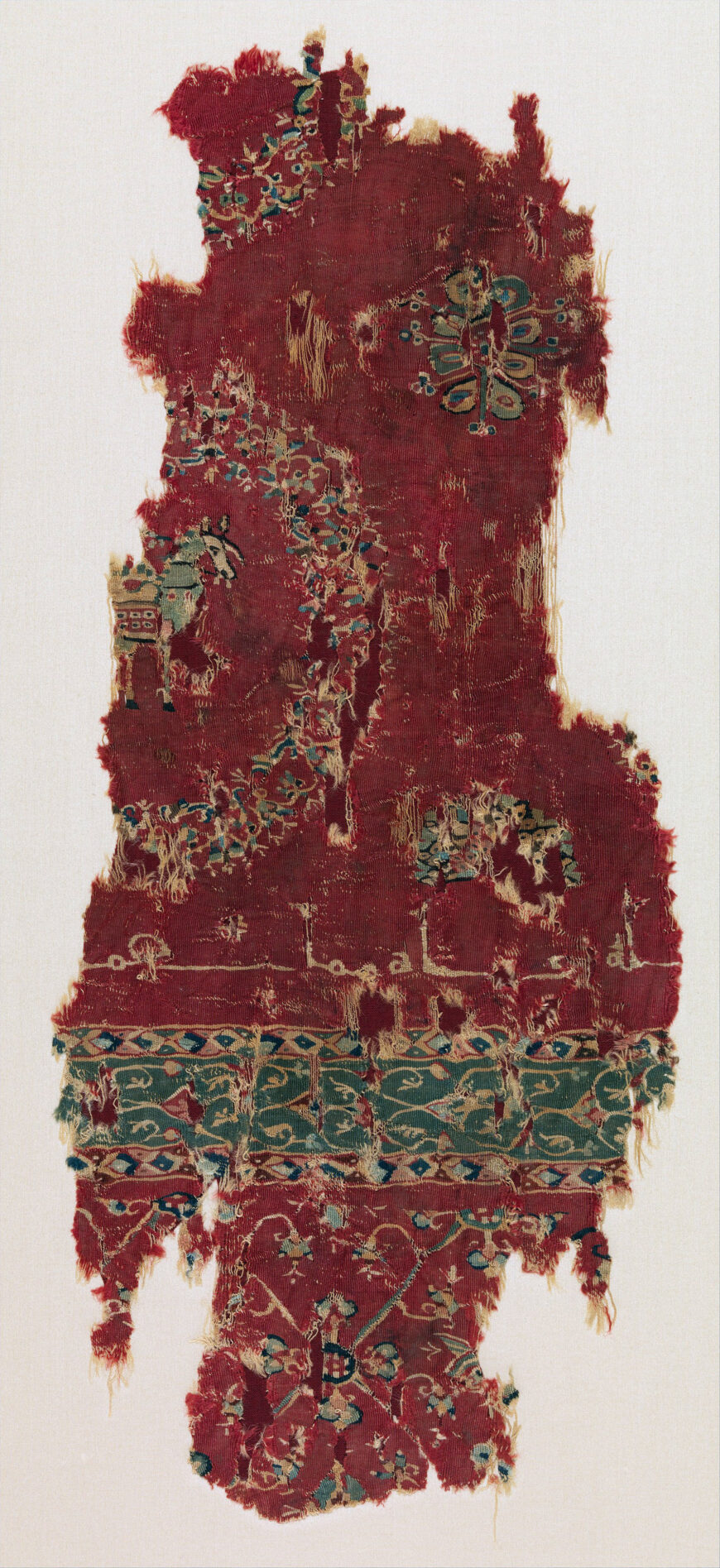 Tapestry-Woven Fragment, 8th century (found Egypt, possibly made in Iraq or Iran), wool, slit-tapestry weave with eccentric wefts, 59.1 x 24.8 cm (The Metropolitan Museum of Art, New York)