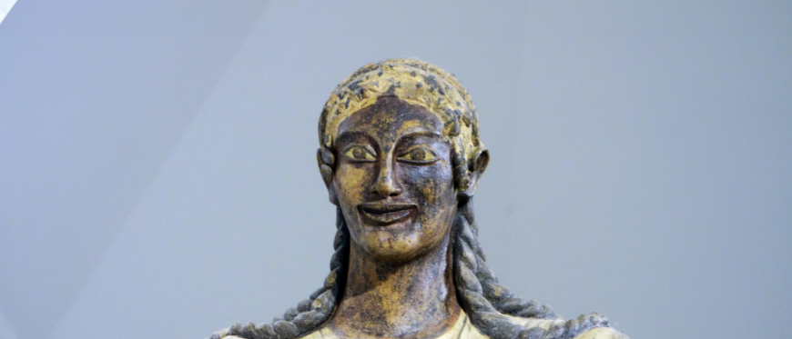 Detail, Aplu (Apollo of Veii), from the roof of the Portonaccio Temple, Veii, Italy, c. 510–500 B.C.E., painted terracotta, 5 feet 11 inches high (Museo Nazionale Etrusco di Villa Giulia, Rome; photo: Steven Zucker, CC BY-NC-SA 2.0)