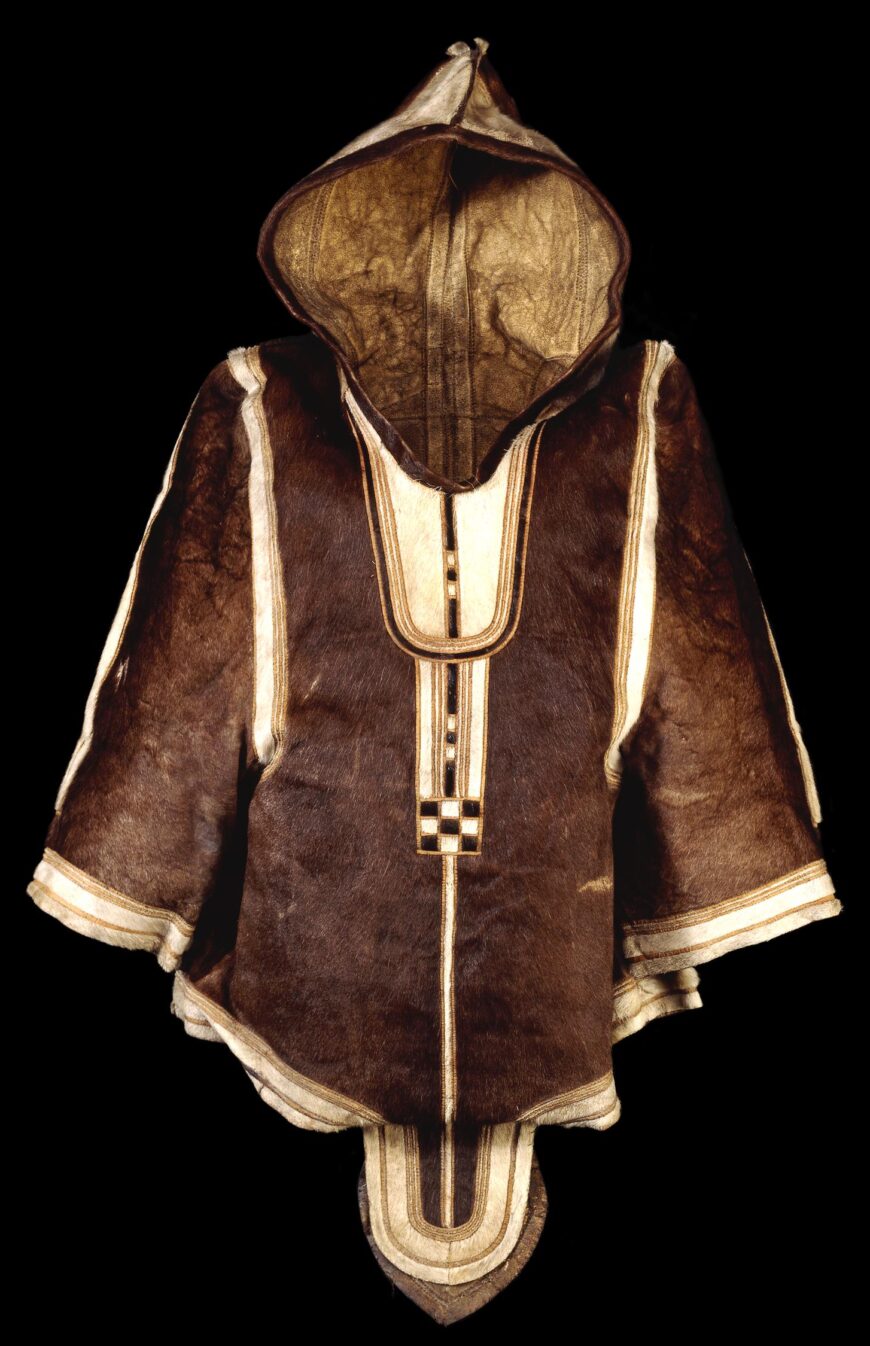 Girl's caribou-skin parka, early 19th century (Inuit, West Greenland), 76 cm (© The Trustees of the British Museum, London). The parka may have been collected in the early 19th century during the search for the Northwest Passage. It is one of the first woman's parkas to be collected in Greenland, and is similar in design to those, discovered with mummies at Qilatiksoq in 1972–78, dating to about 1475.