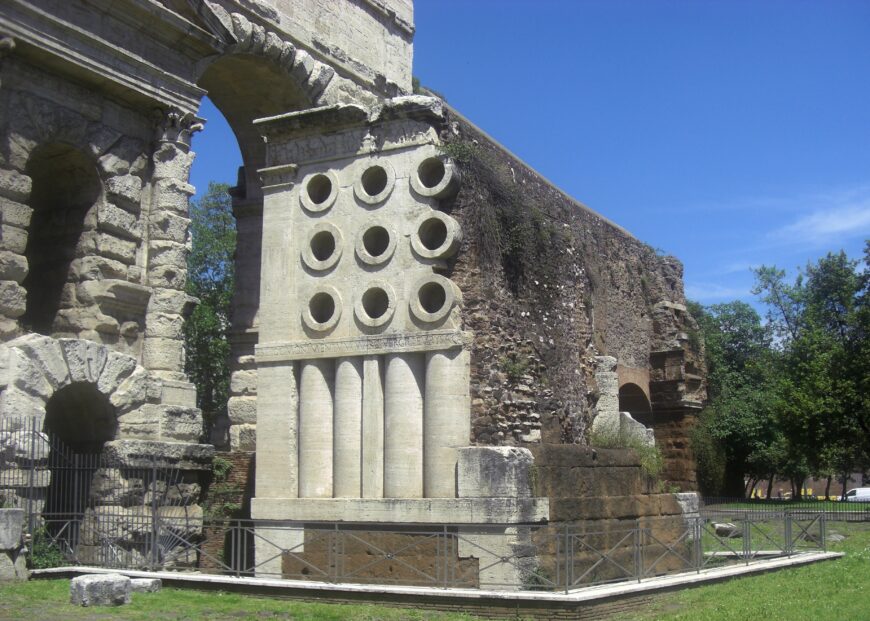 View of the Tomb of Eurysaces, with the Porta Praenestina behind, from the southeast (photo: AncientDigitalMaps, CC BY-NC 2.0)