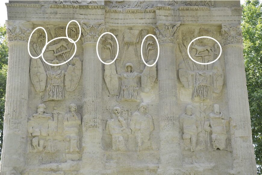 East end of the Arch at Orange showing trophy sculptures with Celtic boar standards and carnykes (annotated detail), Arch at Orange, France, 20s B.C.E., stone, 19.21 x 19.57 x 8.4 m (photo: Carole Raddato, CC BY-SA 2.0)