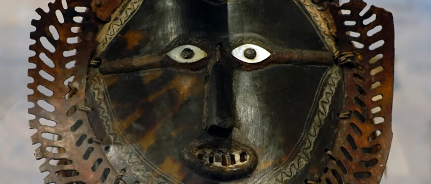 Mask (Buk), Torres Strait, Mabuiag Island, mid to late 19th century,turtle shell, wood, cassowary feathers, fiber, resin, shell, paint, 21 1/2 inches high (The Metropolitan Museum of Art, New York City)