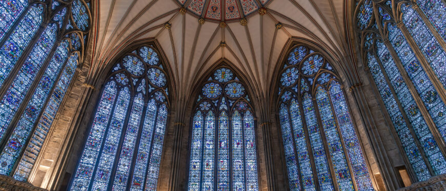 13th and 14th century glass (except the window facing the entry, here in the center, which is 15th and 16th century), Chapter House, York Minster