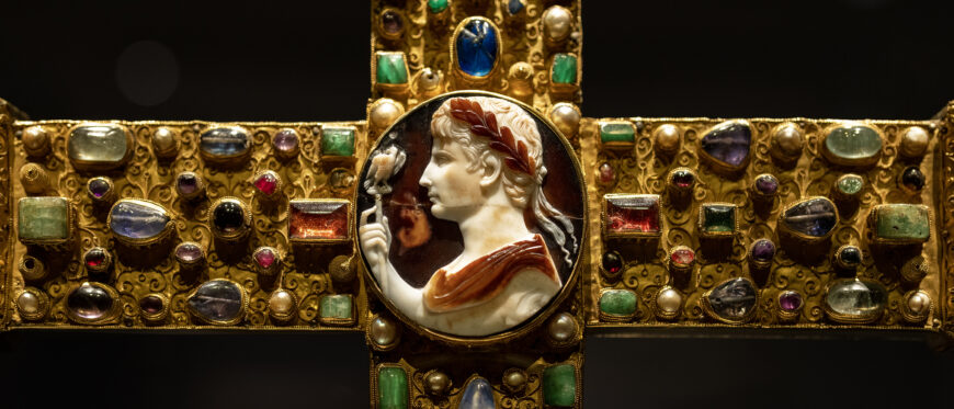 Cross of Lothair II, c. 1000 (Ottonian), oak core, gold, silver, gems, pearls, Augustus spolia cameo, cloisonné enamel, 50 x 38.5 x 2.3 cm, base dates to the 14th century, dedicated by Otto III (Aachen Cathedral Treasury Germany)