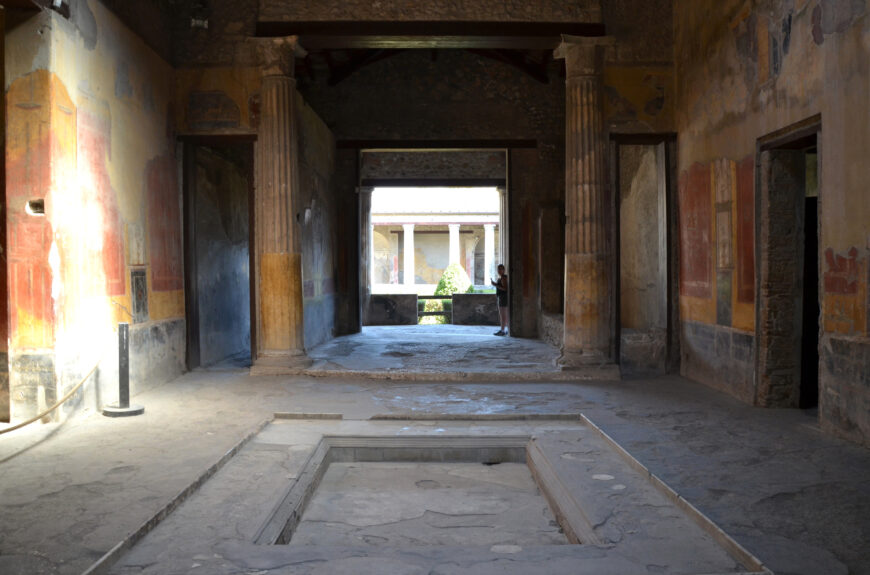 Impluvium in atrium, looking through the tablinum toward the peristyle, House of Menander, Pompeii before 79 C.E. (photo: Carole Raddato, CC BY-SA 2.0)