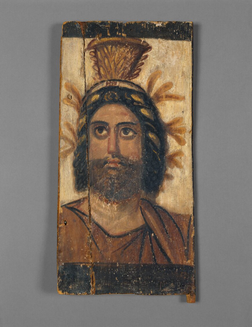 Panel with Painted Image of Serapis, 2nd century C.E. (Egypt), tempera on wood, 39.1 x 19.1 x 1.6 cm (The J. Paul Getty Museum, Los Angeles)