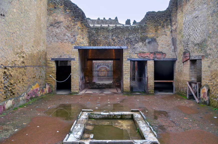 View of the atrium with the mosaic of Neptune and Amphitrite visible through the tablinum, before 79 C.E., House of Neptune and Amphitrite, Herculaneum (photo: Richard Mortel, CC BY-NC-SA 2.0)