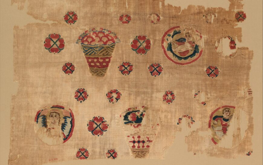 Baskets, floral rosettes, and medallions (detail), Fragment from a Coptic Hanging, 5th century (attributed to Egypt), linen, wool, plain weave and tapestry weave, 104 x 63 cm (The Metropolitan Museum of Art, New York)