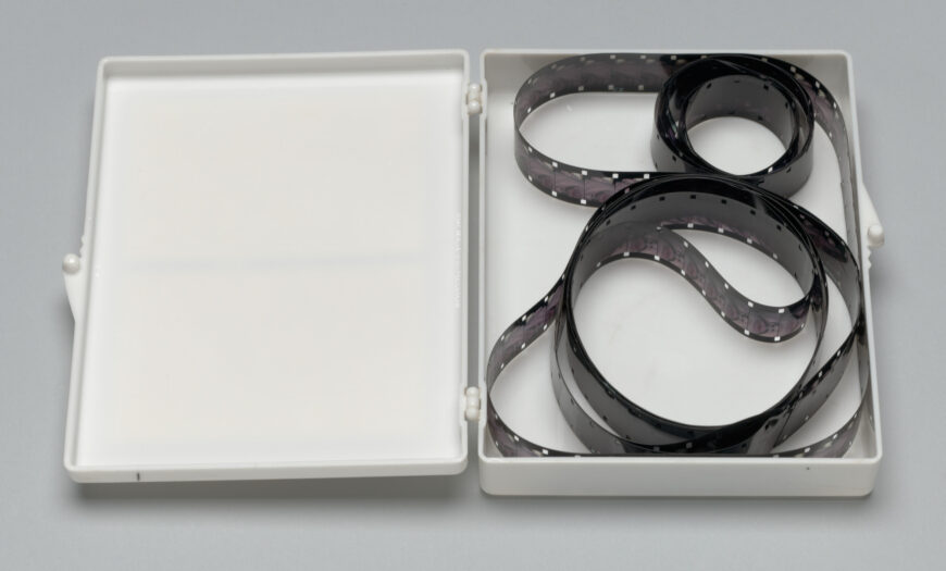 Dick Higgins, Invocation of Canyons and Boulders, 1965, plastic box with offset labels, containing film loops, 12 x 10 x 2.6 cm (The Museum of Modern Art, New York) © Dick Higgins