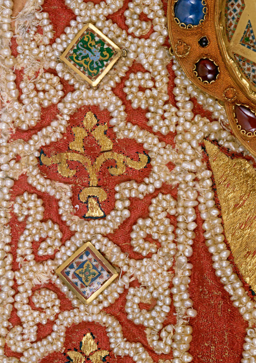 Pearls (detail), Mantle of Roger II, 1133/34 (Norman Sicily, Italy), textiles, patterned samite (kermes dye), gold and silk embroidery, pearls, gold with cellular enamel, rubies, spinels, sapphires, garnets, glass, tablet weave, 146 x 345 cm (Kunsthistorisches Museum, Vienna, XIII 14)